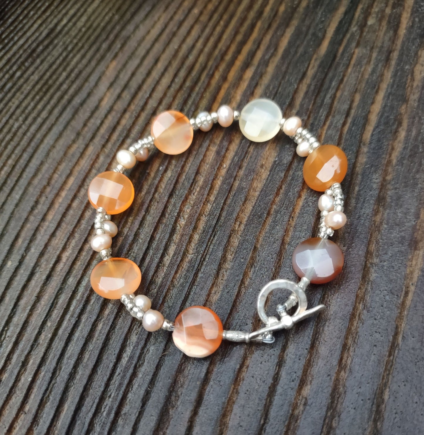B048 Debra Saldivar - Bracelet, Faceted Carnelian Coins, Freshwater Pearls, Sterling Silver